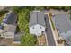Aerial view of the property highlighting the home's layout, backyard pergola, driveway, and surrounding residential neighborhood at 676 Juneberry Se Ln, Atlanta, GA 30316