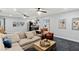 Large basement features plush carpeting, comfortable seating, stylish decor, and a mini bar at 676 Juneberry Se Ln, Atlanta, GA 30316