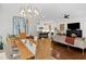 Open-concept dining area offers a view into the kitchen and living room at 676 Juneberry Se Ln, Atlanta, GA 30316