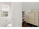 Bright dressing room boasting ample storage with a dresser and shelving, providing an organized space at 676 Juneberry Se Ln, Atlanta, GA 30316