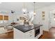 Bright, open concept kitchen boasts a kitchen island and seamlessly connects to the living area at 676 Juneberry Se Ln, Atlanta, GA 30316