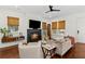 Bright and airy living room with a fireplace and natural light at 676 Juneberry Se Ln, Atlanta, GA 30316