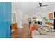 Open-concept living room with hardwood floors and views of the kitchen at 676 Juneberry Se Ln, Atlanta, GA 30316