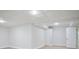Unfinished basement featuring white walls, recessed lights, and two storage closets at 831 Sweet Briar Se Ln, Conyers, GA 30094
