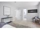 Spacious bedroom featuring modern decor, neutral walls, and plush carpeting at 831 Sweet Briar Se Ln, Conyers, GA 30094