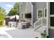 Backyard with an outdoor kitchen, bar, and a large television at 1446 Wilford Ne Dr, Atlanta, GA 30319