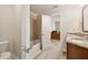 Bathroom with tile flooring, a tub and shower combination, and granite countertop at 1446 Wilford Ne Dr, Atlanta, GA 30319