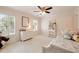 Charming bedroom with natural light, a ceiling fan, and light-colored walls at 1446 Wilford Ne Dr, Atlanta, GA 30319