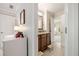 Hallway featuring a bathroom and ample natural light at 1446 Wilford Ne Dr, Atlanta, GA 30319