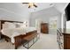Spacious main bedroom with vaulted ceilings, neutral colors, and large windows at 1446 Wilford Ne Dr, Atlanta, GA 30319