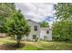 Exterior shot of a home’s backyard and partial view of the back of the house at 3311 Lavista Dr, Hapeville, GA 30354