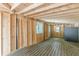 Spacious unfinished basement featuring wooden beams and bright natural light at 3311 Lavista Dr, Hapeville, GA 30354