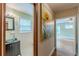 Stylish bathroom featuring a modern glass vessel sink and classic white tiled walls at 3311 Lavista Dr, Hapeville, GA 30354