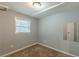 Bedroom with carpeted floors, gray walls, and a window providing natural light at 3311 Lavista Dr, Hapeville, GA 30354