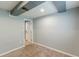 Cozy bedroom with neutral walls, carpeted floor, and open doorway leading to another room at 3311 Lavista Dr, Hapeville, GA 30354