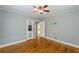 Bedroom with hardwood floors, ceiling fan, and gray walls at 3311 Lavista Dr, Hapeville, GA 30354