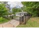 A charming single-story home enclosed by a stylish black metal fence and gate at 3311 Lavista Dr, Hapeville, GA 30354