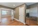 Kitchen area featuring stainless steel refrigerator and access to a bright dining room at 3311 Lavista Dr, Hapeville, GA 30354