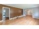 Open-concept living room with hardwood floors and views to other rooms at 3311 Lavista Dr, Hapeville, GA 30354