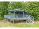 Exterior view showcasing an elevated blue deck with an in-ground pool at 3311 Lavista Dr, Hapeville, GA 30354
