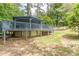 Backyard view showcasing an elevated deck featuring an in-ground pool at 3311 Lavista Dr, Hapeville, GA 30354