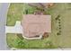 Overhead shot of home displaying roof, back deck, pristine yard, and landscaping at 4605 Heathcliff Way, Cumming, GA 30041