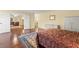 Well-lit Primary bedroom with hardwood floors, an open design, and ample space at 4605 Heathcliff Way, Cumming, GA 30041