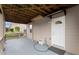 A covered patio provides access to a door that goes to the inside of the home at 4605 Heathcliff Way, Cumming, GA 30041