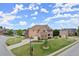 Corner lot home with an expansive lawn, long driveway, and traditional brick facade at 4605 Heathcliff Way, Cumming, GA 30041