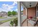 Inviting front porch with seating and views of the street at 4605 Heathcliff Way, Cumming, GA 30041