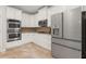 Well-equipped kitchen with modern stainless steel appliances and ample cabinet space at 4605 Heathcliff Way, Cumming, GA 30041