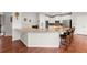 Spacious kitchen with granite countertops, stainless steel appliances, and breakfast bar at 4605 Heathcliff Way, Cumming, GA 30041