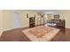 Spacious living room with new hardwood floors, large windows, and a comfortable seating area at 4605 Heathcliff Way, Cumming, GA 30041