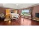 Spacious main bedroom with hardwood floors and a large window at 4605 Heathcliff Way, Cumming, GA 30041