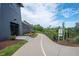 Paved walking trail with signage, perfect for a leisurely stroll or outdoor exercise at 4605 Heathcliff Way, Cumming, GA 30041