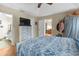 Spacious main bedroom featuring wood floors, a ceiling fan, and neutral paint at 10 Mcgiboney Pl, Covington, GA 30016