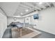Entertainment area featuring a ping pong table, television, and a comfortable seating area at 2193 Cloverdale Se Dr, Atlanta, GA 30316