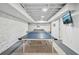 Finished basement with ping pong table, TV, and ample space for recreation and relaxation at 2193 Cloverdale Se Dr, Atlanta, GA 30316