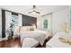 Spacious bedroom featuring modern design, hardwood floors, and plenty of natural light at 2193 Cloverdale Se Dr, Atlanta, GA 30316