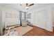 Charming Bedroom with a crib, glider, and natural light, perfect for a growing Gathering at 2193 Cloverdale Se Dr, Atlanta, GA 30316