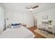 Cozy bedroom features a ceiling fan, natural light, and a dedicated workspace at 2193 Cloverdale Se Dr, Atlanta, GA 30316