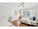 Cozy bedroom features a ceiling fan, natural light, and a comfortable sleeping space at 2193 Cloverdale Se Dr, Atlanta, GA 30316