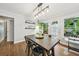Dining area featuring wood floors and a view of the outdoor deck at 2193 Cloverdale Se Dr, Atlanta, GA 30316