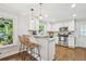 Modern kitchen with stainless steel appliances and a breakfast bar at 2193 Cloverdale Se Dr, Atlanta, GA 30316