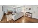 Bright living room with hardwood floors, large windows, and a modern ceiling fan at 2193 Cloverdale Se Dr, Atlanta, GA 30316