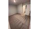 Carpeted bedroom ready for furnishing at 30 Barton Ln, Covington, GA 30016