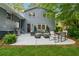 Well-maintained backyard with patio, grill, and comfortable seating, perfect for outdoor living at 3772 Evans Rd, Atlanta, GA 30340