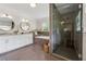 Bathroom offering a double vanity, soaking tub, and walk-in shower at 3772 Evans Rd, Atlanta, GA 30340