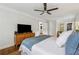 Bright bedroom with dark hardwood floors and a ceiling fan at 3772 Evans Rd, Atlanta, GA 30340