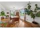 Bright dining room featuring hardwood floors, natural light, and a wooden table at 3772 Evans Rd, Atlanta, GA 30340